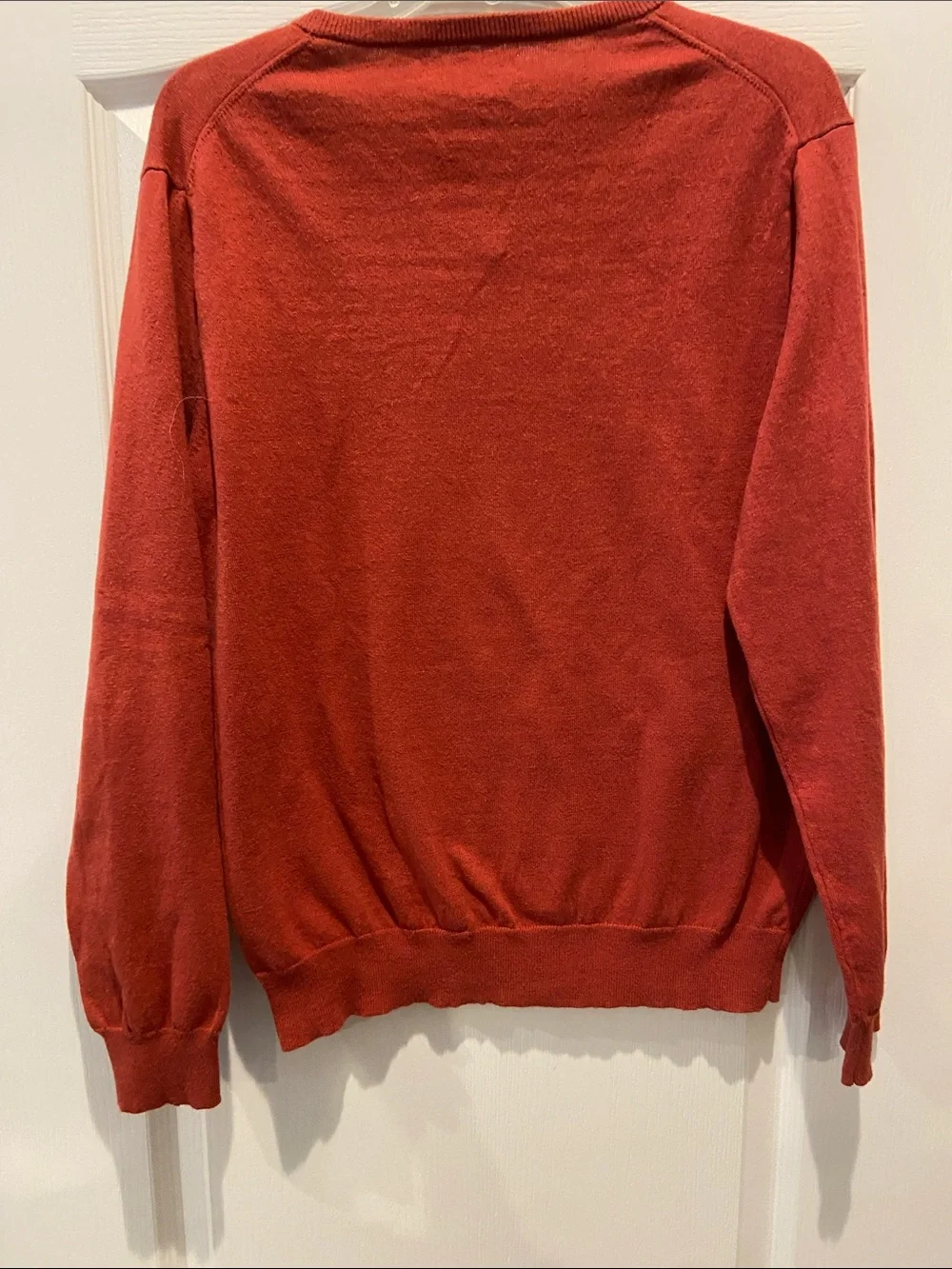 J. Crew Men’s V‑Neck Sweater in Rust Red
